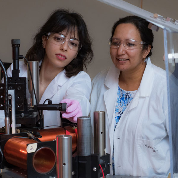 Sibani Lisa Biswal in lab with graduate student