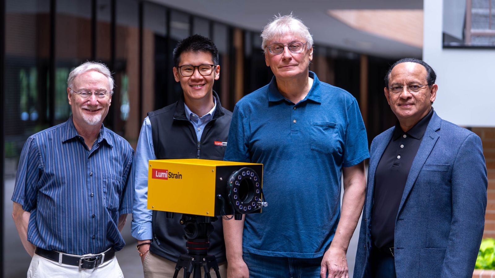 LumiStrain researchers pose by  S4 technology 