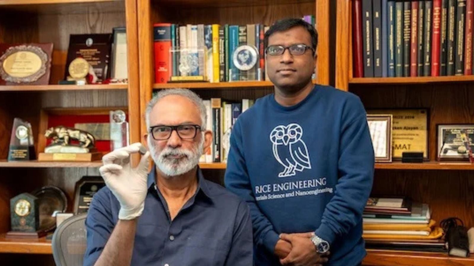 Pulickel Ajayan, holding a diamond composite material, and Abhijit Biswas