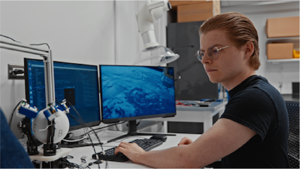 student with computer