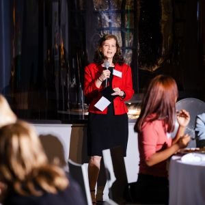 Wanda Gass teaches in front of a classroom