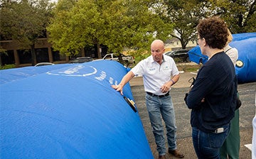 SSPEED Director Phil Bedient shows inflatable barriers