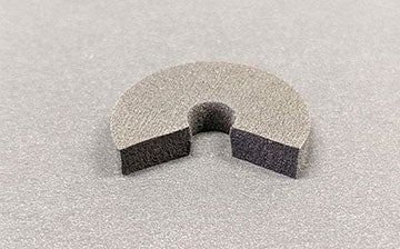 foam-based fluidic resistor