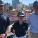 Dean Luay Nakhleh, left, Wanda Gass and Richard Gass wearing hard hats and standing atop the Ralph S. O'Connor Building.