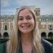 Headshot of Sara Denison with Rice University building in the background.