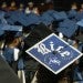 graduation cap with Rice "R"